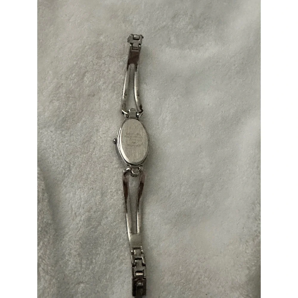 Armitron Now Silver Tone Bangle Watch Pink‎ Face Rhinestone Accent Womens